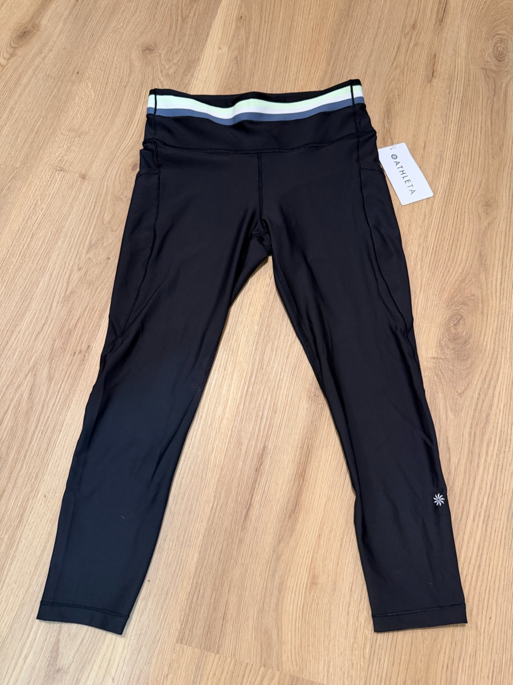 NWT Athleta Interval Stash 7/8 Stripe Tight Leggings Black Size Large Pockets